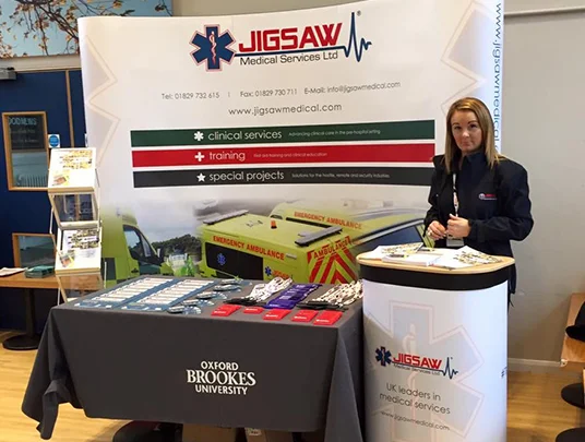 Exhibition stand and table by Wattage Media for Jigsaw Medical conference