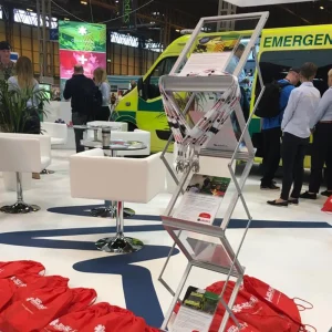 Leaflet rack with flyers designed by Wattage Media at Emergency Services Show